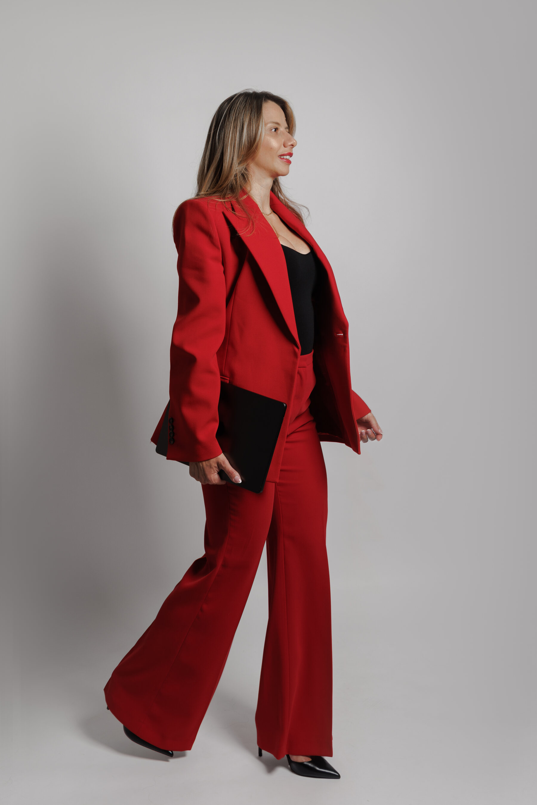 Monika Stachurska in a red suit